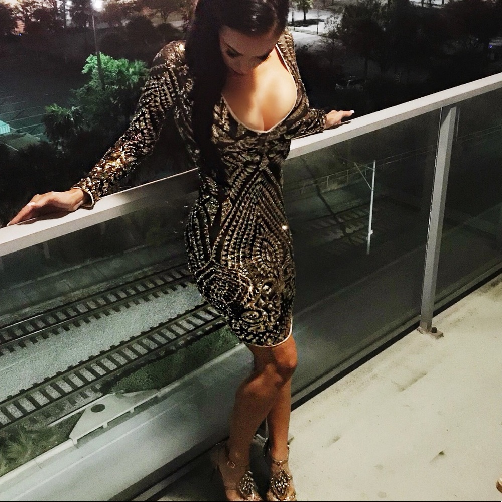 Black and gold sequin long sleeve midi dress